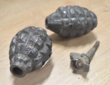 WW2 USA Mk II Pineapple hand grenade, inert with remains of fuse, remnants of original green paint