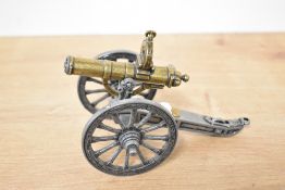 Gatling Gun 1883 miniature scale model, metal body design with metal wheels and fittings, brass 10cm