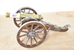 Dahl Gren 1861 miniature scale model cannon, wood body design with metal rimmed wheels and fittings,