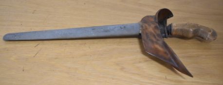 Malayan or Indonesian Kris dagger with carved walnut grip and 'boat-shaped' collar, this detached,