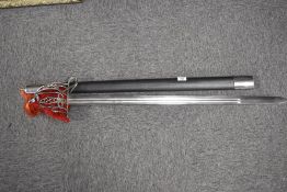 Scottish Highlander’s basket hilt sword, 89cm double-edged fullered clean blade, pierced and