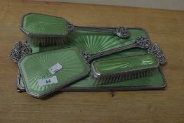 An attractive green Art Deco style vanity / dressing table set, to include tray and brush ect