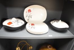 A pair of Midwinter 'Carmen' pattern tureens with covers, w25cm, sold together with 4 plates and 1