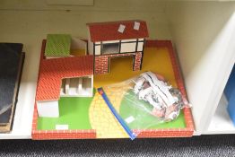 A 20th century wooden farm yard, w46cm, sold together with plastic animals