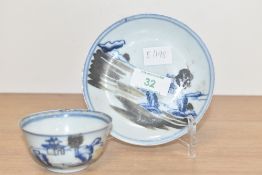A Japanese or Chinese porcelain tea bowl and saucer, bearing Christie's sale label to base, (2)
