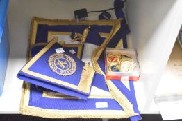 A Cumberland Westmorland Masonic Regalia with cuffs and 7 badges