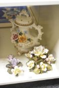 A Napoleon ceramic tea pot with cover, decorated with floral patterns, having shaped spout and