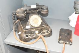 A black 'pyramid' style telephone box phone, h20cm