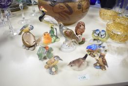 A Goebel style porcelain crane, h15cm, sold together with an eagle, blue tits and various other