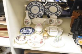 A Coalport cup and saucer having gilt edge and floral patterns, painted mark to reverse No '6514/A',