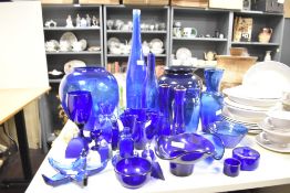 A large collection of blue glass, to include vases, trinkets and bottles ect