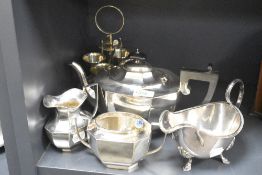 A silver plated 4 piece egg cruet set with spoons, h21cm, sold together with a silver plated sugar