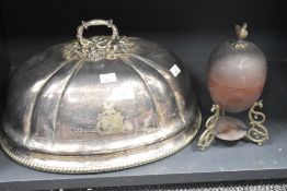 A plated meat dome having etched decoration and beaded handle, w41cm sold together with a novelty
