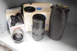 A Canon Titanium '0.42X AF' lens, sold together with a Hanimex lens and carry bag ect