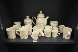 A Royal Doulton 'Florinda' pattern ceramic tea service, to include tea pot, chocolate pot, cups