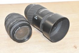 Two Minolta fit lenses, a Minolta 70-210mm f3.5-4.5 lens and a Sigma 28-70mm f3.5-4.5 lens.