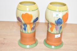 A pair of Clarice Cliff 'Autumn Crocus' pattern vases decorated in the Art Deco style, h21cm