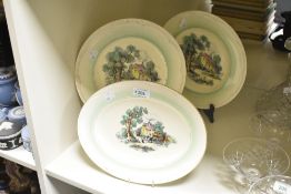 A Clarice Cliff Cotswold Newport pattern oval dish having country scene and gilt edging, w28cm, sold