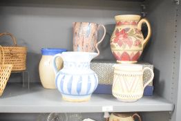 A group of studio pottery pitchers, to include Buchan of Portobelo and Poole pottery ect, (5)
