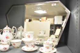 An early 20th century mirror having bevelled edges, L67.5cm