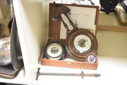 An early 20th century mahogany barometer having temperature gauge, h44cm, sold together with 1 other