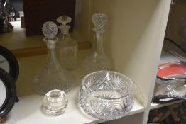 A group of crystal glass decanters sold together with a bowl and candle holder, (5)