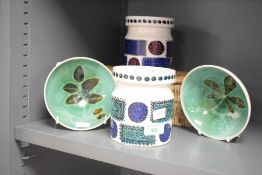 A Susan Williams Ellis 'Talisman' pattern jar with cover, h12cm, sold together with a similar jar