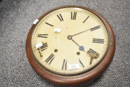 A 19th century cased wall clock having Roman numerals and two keys, w37cm