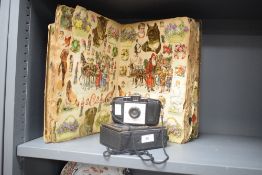 A Kodak 'Brownie 127' camera, sold together with a scrapbook