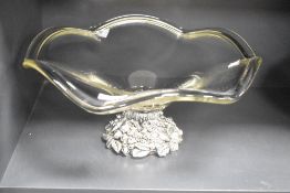 A glass punch bowl raised on a circular base decorated with fruit and foliage, h17cm, sold