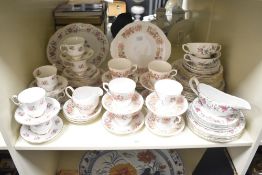 An Elizabethan fine bone china tea service having gilt edge and floral patterns, sold together