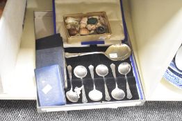 A canteen of silver plated spoons, sold together with a box of sea shells ect