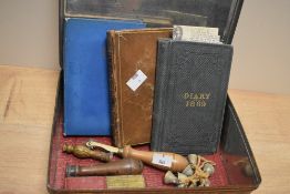 A 19th century Diary, sold together with a wax seal and miniature brass bells ect