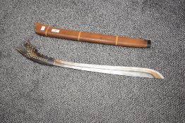 A vintage long bladed knife with wooden sheath, L71cm