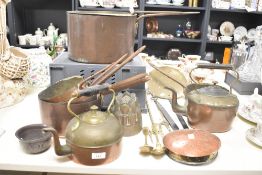 A large copper stock pot with cover, h19cm, sold together with a jelly mould, tea pot and fire tools
