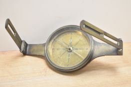 A late 19th / early 20th century brass nautical compass having engraved makers mark 'Hewitson