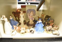 A quantity of figurines, to include a miniature doll and match box ect