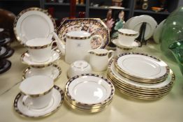 A Royal Crown Derby 'Kadleston' pattern dinner service, to include plates, cream jug and cups ect
