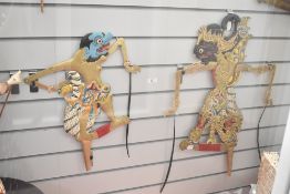 Two Indonesian handcrafted Wayang or puppets, largest h60cm *Wayang puppets have been a part of