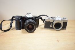 Two Minolta 35mm cameras, a Minolta SR-1s and a Minolta Maxxum 7000i with a Sigma 35-70mm f3.5-f4.