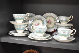 A Royal Albert 'Enchantment' pattern tea service comprising of 6 cups, 6 saucers and 6 dessert