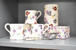A set of 4 mugs by Emma Bridgewater, h10cm, sold together with cutlery, vase and tin.