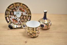 A Royal Crown Derby 'imari' pattern tea cup, h6.5cm, sold together with two others