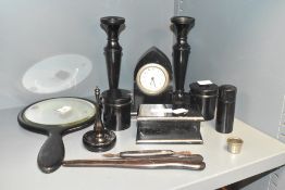 A pair of Ebony candlesticks, h18.5cm, sold together with an ebony clock and mirror ect, (12)