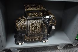 A black ceramic elephant garden stool / plant stand, h43cm