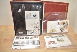 3 stamp albums containing Royal Mail First Class Bird stamps, R S P C A, Dogs, Diana and Churchill
