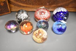 A Millefiori style glass paperweight, w8cm, sold together with a mushroom paperweight ect, (8)