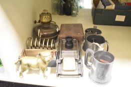 A mother of pearl cigarette case, L8cm, sold together with a pewter tankard and a brass dog ect