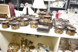 A Denby 'Arabesque' pattern dinner service, to include tureens, butter dish and plates ect