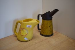 A Shell Motor Oil jug with similar retro plastic jug
